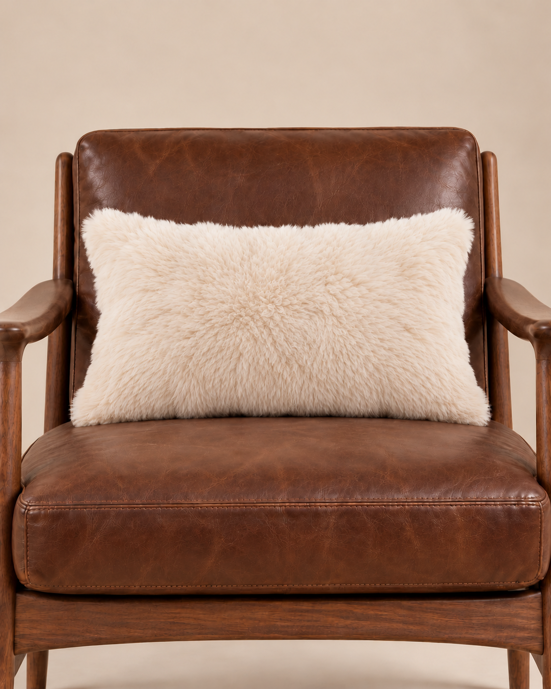 Pillow Sweet ivory cushion in a bright bedroom